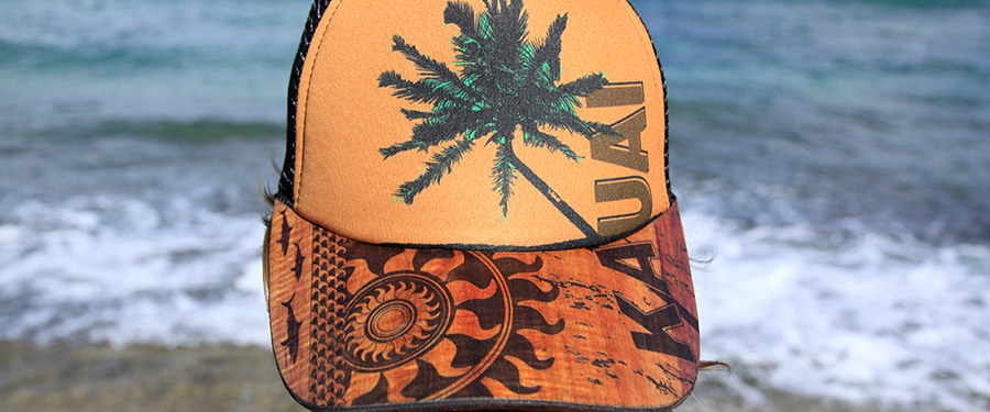 A hat with an image of a palm tree on it.